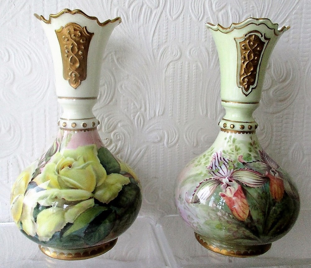 pair of english studio pottery handpainted and gilded persian porcelain vases roses and orchids reginald johnson