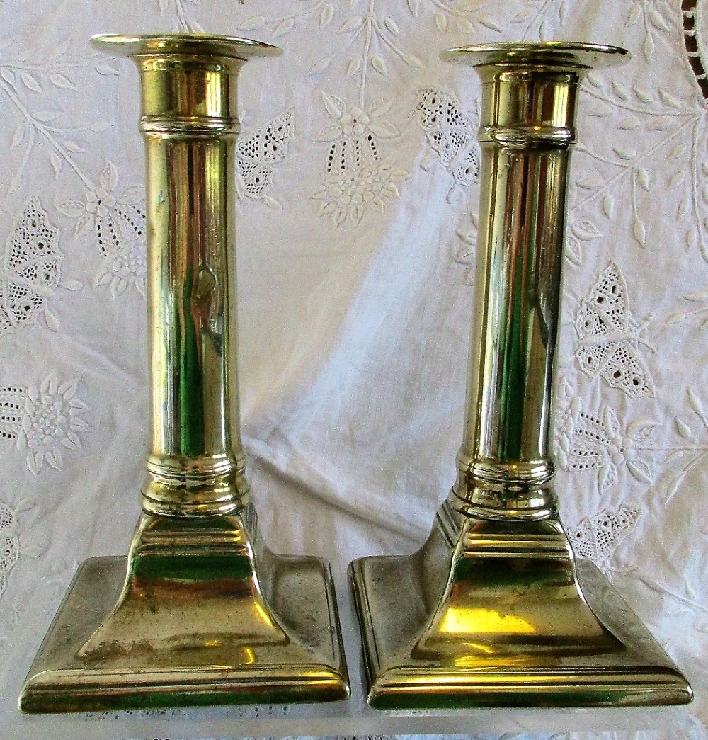 pair of antique english georgian brass candlesticks