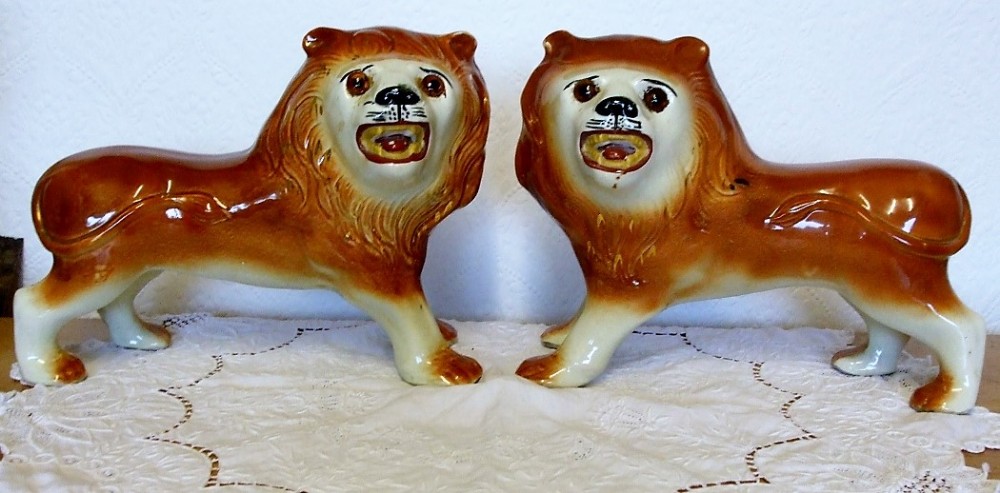 pair of antique english victorian staffordshire pottery lions h 4655 h 4656