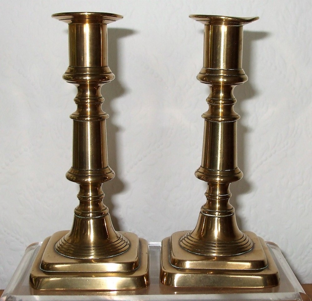 pair of antique english late georgian brass candlesticks