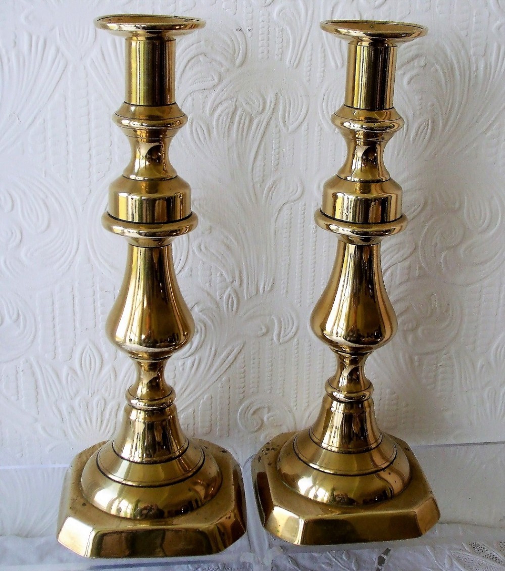 pair of antique english late georgian brass candlesticks