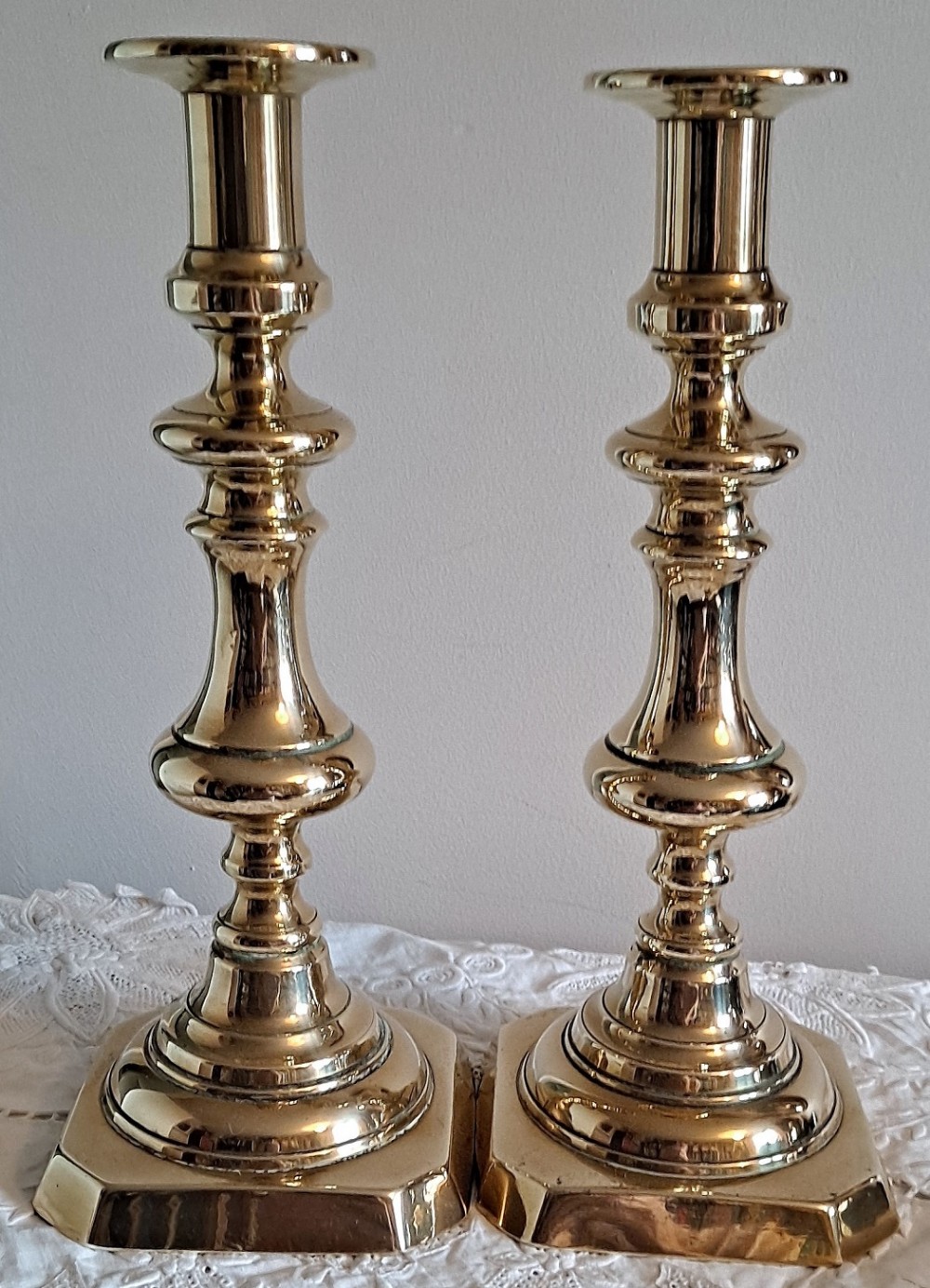 pair of antique english late georgian brass candlesticks