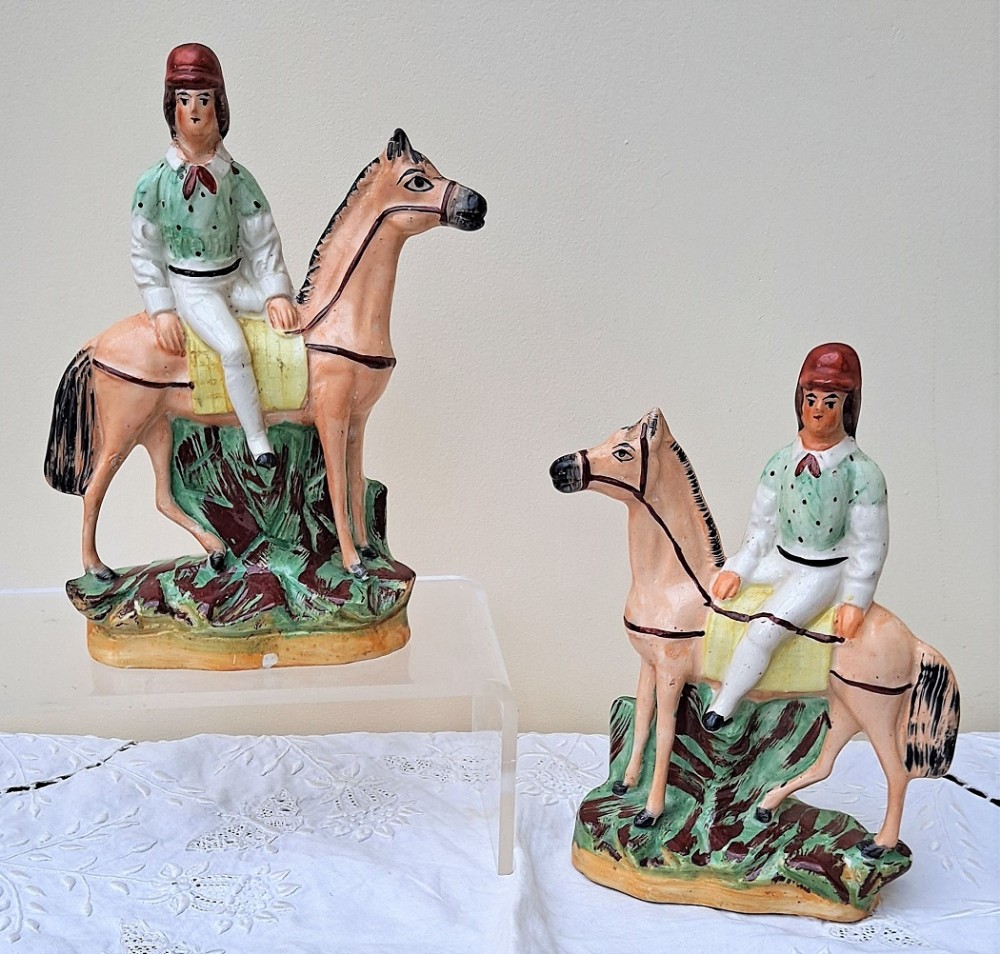 pair of antique english victorian staffordshire pottery figures of mounted jockeys h 3312 h 3313