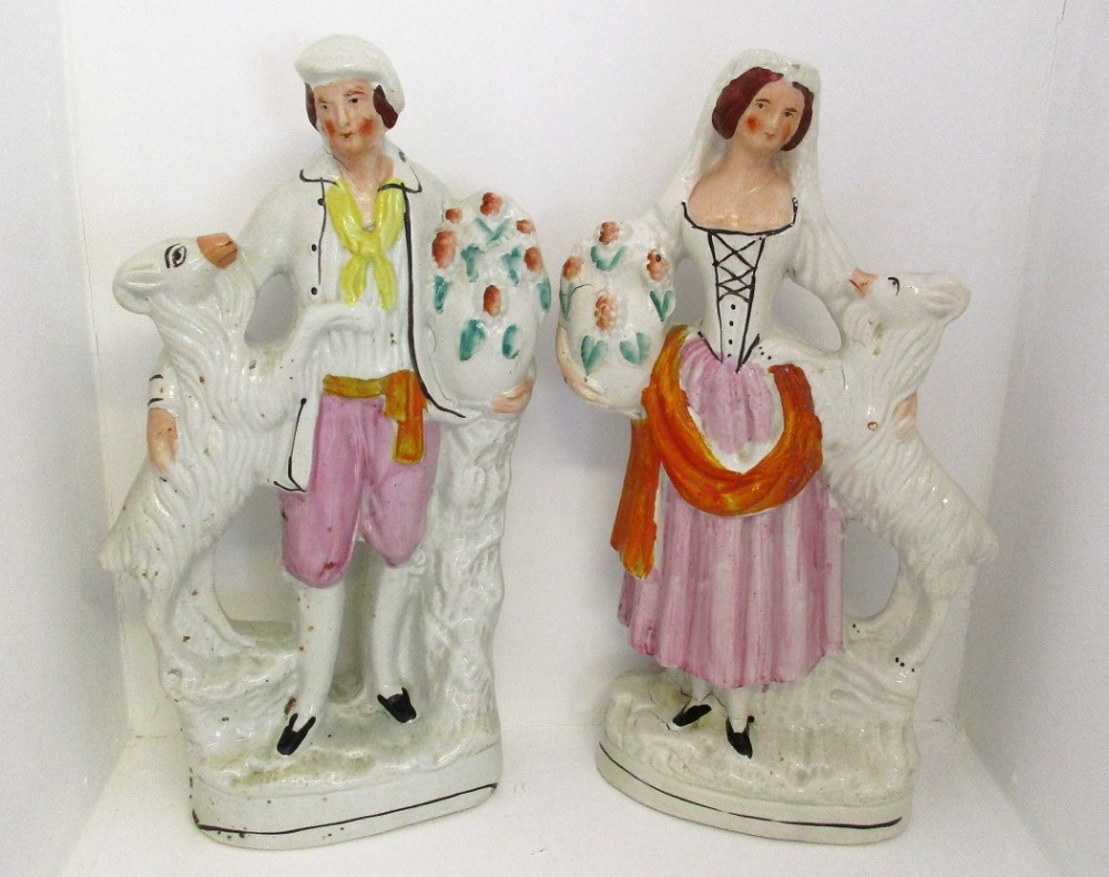 pair of antique english victorian staffordshire pottery figures of goatherds h 2084c h 2084d