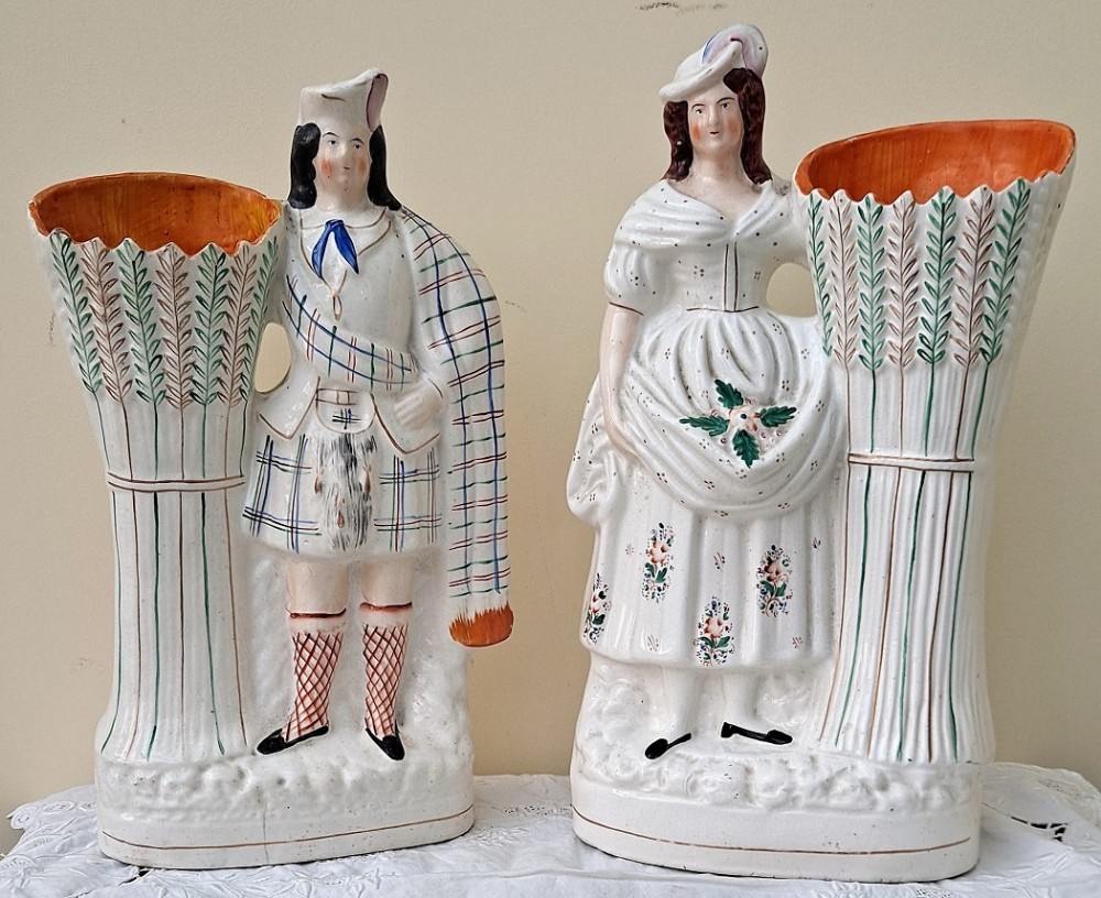 pair of victorian staffordshire scots harvesters spill vases