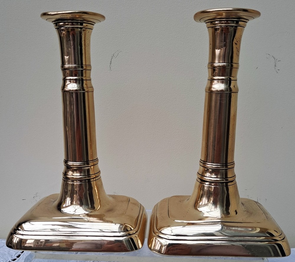 pair of antique english georgian telescopic brass candlesticks