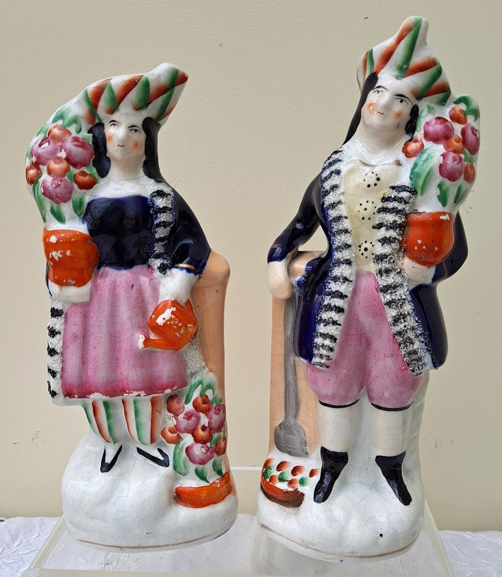 pair antique english victorian staffordshire pottery gardeners