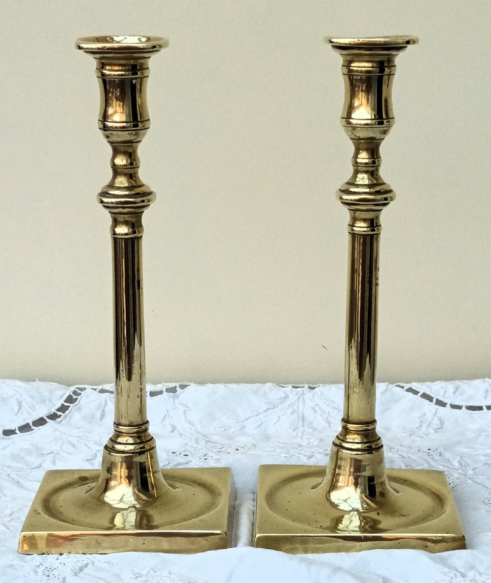 pair of antique english georgian brass candlesticks