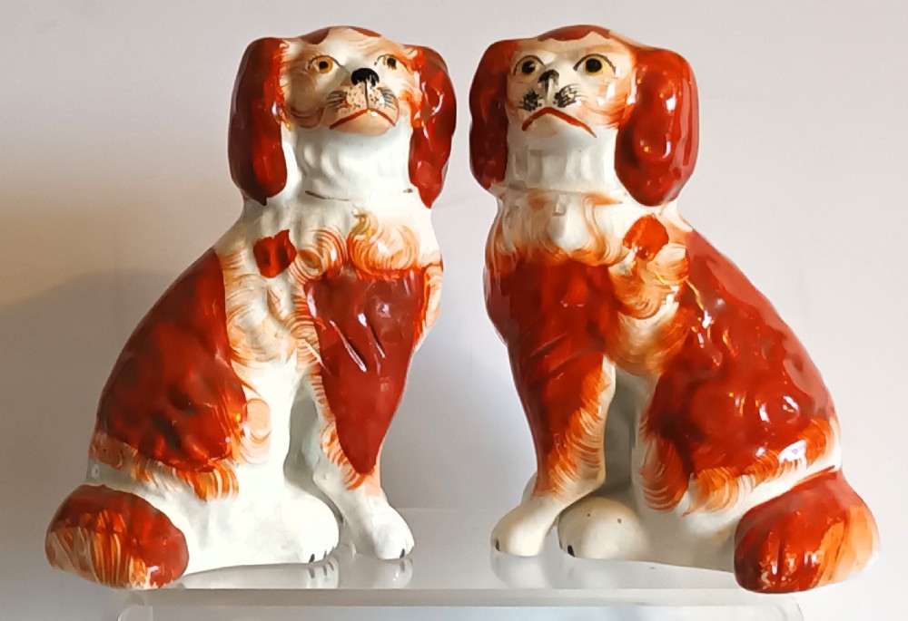 pair of antique victorian staffordshire spaniels