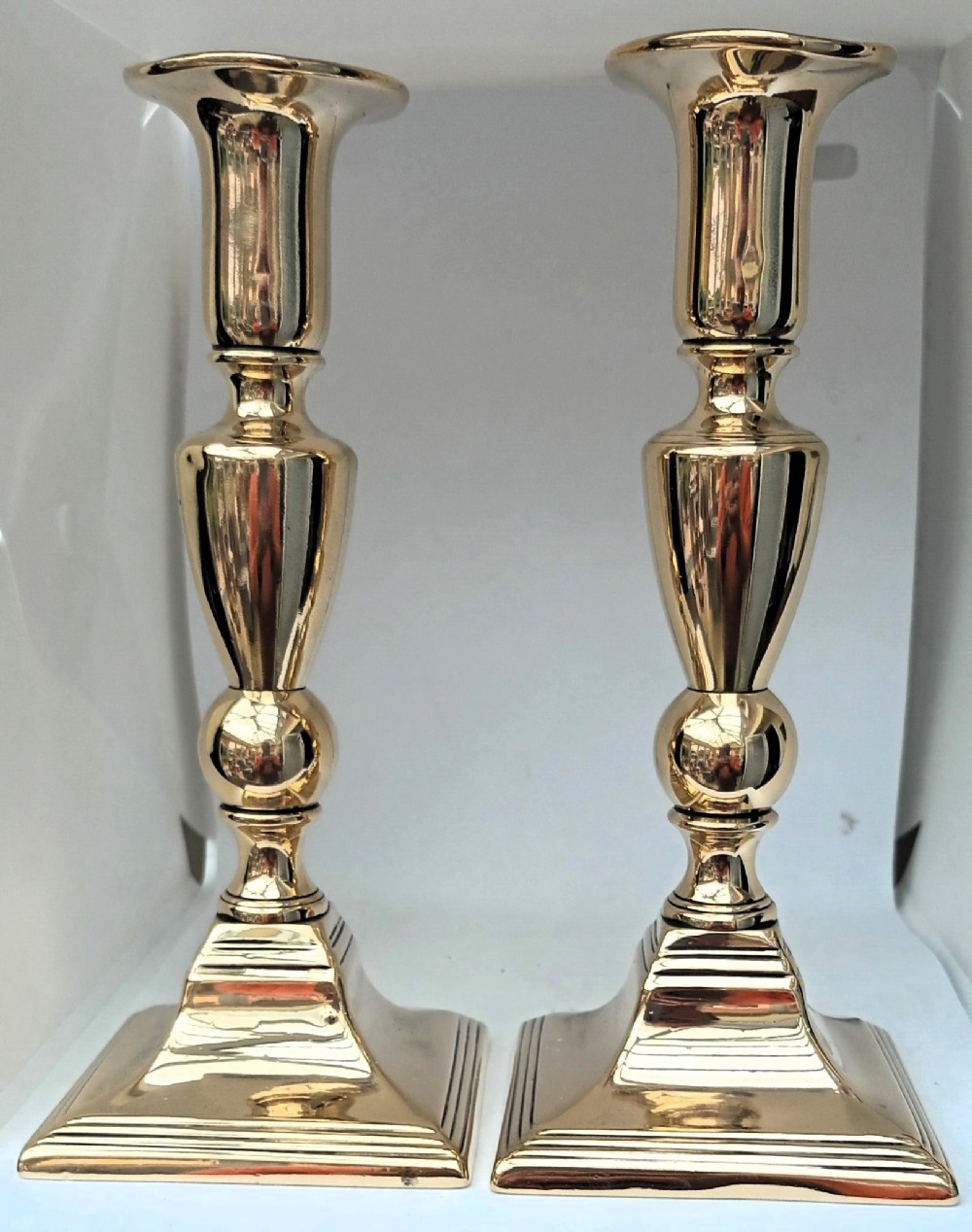 pair of antique english georgian brass candlesticks