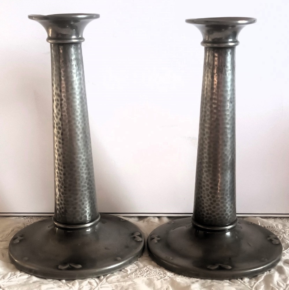 pair of antique arts and crafts pewter candlesticks