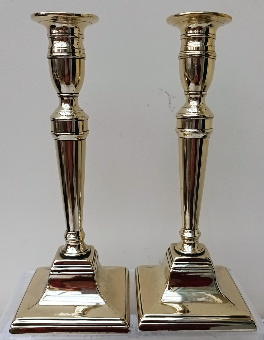 pair of antique english georgian brass candlesticks